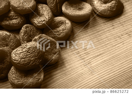 Dried fruits on a wooden table Dried fruits on a wooden table 86625272