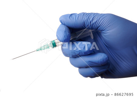 Medic Hand Prepares Syringe Shot - Isolated Photo Medic Hand Prepares Syringe Shot - Isolated Photo 86627695