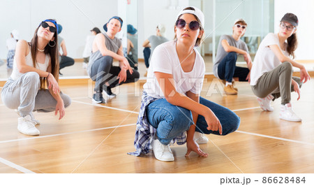 Boy and girls having dancing class Boy and girls having dancing class 86628484