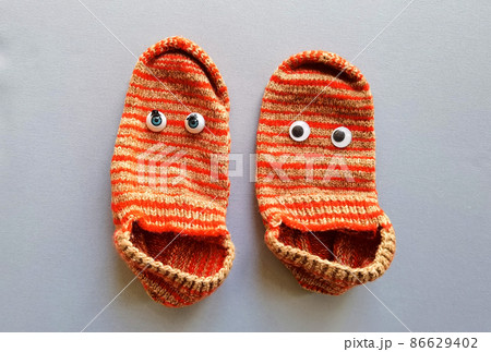 funny doll sock on gray background, hand theater funny doll sock on gray background, hand theater 86629402