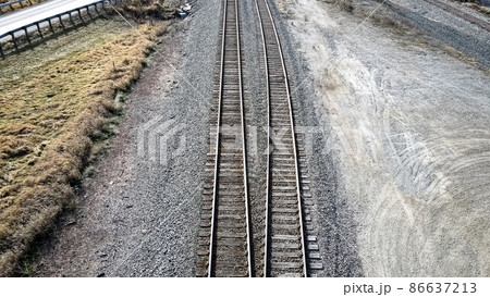 A pair of railroad tracks A pair of railroad tracks 86637213
