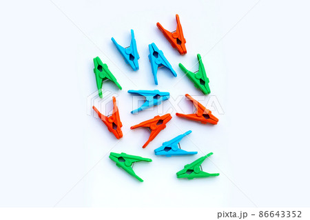 Plastic clothespin on white background. 86643352