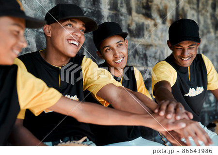 If we win, we win as a team. Cropped shot of a group of young baseball players sitting together on the bench during a game. If we win, we win as a team. Cropped shot of a group of young baseball players sitting together on the bench during a game. 86643986