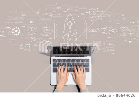 Rapid growth concept with person using laptop Rapid growth concept with person using laptop 86644026