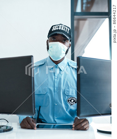 I keep all unwelcome guests out, including viruses. Portrait of a confident masked young security guard on duty at the front desk of an office. I keep all unwelcome guests out, including viruses. Portrait of a confident masked young security guard on duty at the front desk of an office. 86644217