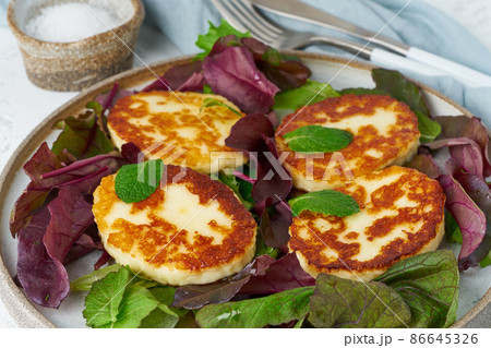 Cyprus roasted halloumi with salad mix, beet tops. Lchf, pegan, fodmap 86645326