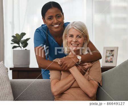 My nurse, my carer, my companion. Shot of a doctor caring for a senior woman at home. 86649127