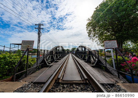 Railway on a Bridge over the River Kwai, Kanchanaburi, Thailand. 86650990