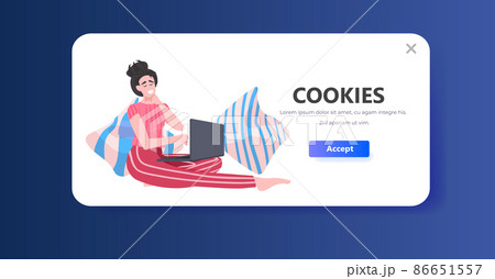 woman using laptop cookie protection of personal information internet web pop up we use cookies policy notification woman using laptop cookie protection of personal information internet web pop up we use cookies policy notification 86651557