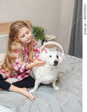 Child girl and dog. 86656663