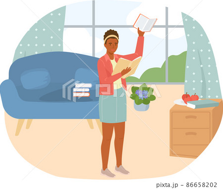 Young woman reading book standing near stack of books in living room, studying at home 86658202