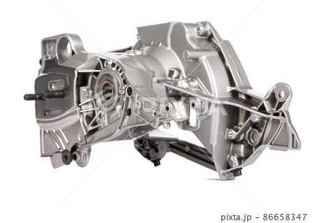 aluminum crankcase close-up for a chainsaw on a white background aluminum crankcase close-up for a chainsaw on a white background 86658347