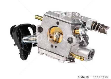 new aluminum carburetor close-up on a white isolated background new aluminum carburetor close-up on a white isolated background 86658350