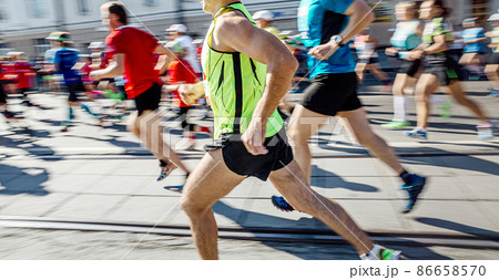 group athletes runners running marathon motion blur group athletes runners running marathon motion blur 86658570