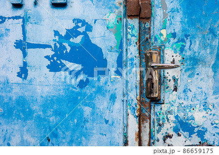 Background of old steel door lock with blue color painted. Background of old steel door lock with blue color painted. 86659175