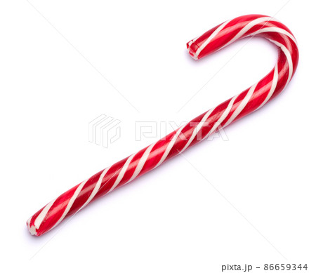 Christmas and New Year concept - sweet Christmas caramel stick isolated on white background 86659344