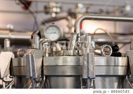 close up of stainless steel jacketed reactor close up of stainless steel jacketed reactor 86660585