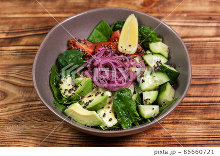 salad mix with avocado and cucumber, with balsamic dressing 86660721