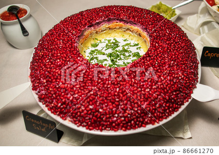 Healthy salad of fresh vegetables and pomegranate seeds Healthy salad of fresh vegetables and pomegranate seeds 86661270