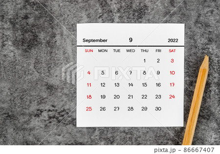 September 2022 and wooden pencil on vintage dark background. September 2022 and wooden pencil on vintage dark background. 86667407