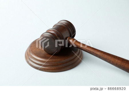 Wooden judge gavel on white background, close up Wooden judge gavel on white background, close up 86668920