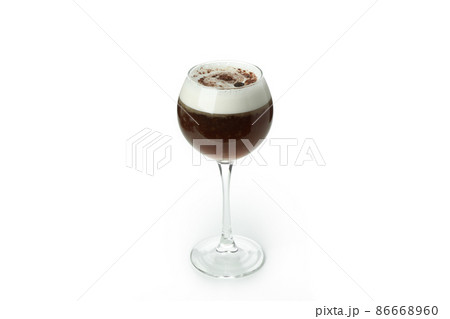 Glass of irish coffee isolated on white background Glass of irish coffee isolated on white background 86668960