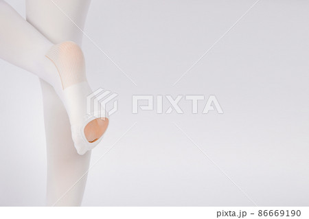 Anti-embolic Compression Hosiery for surgery isolated on white. Medical white stockings, tights for varicose veins and venouse therapy. Thrombo embolic deterrent hose or anti-embolism stockings. 86669190