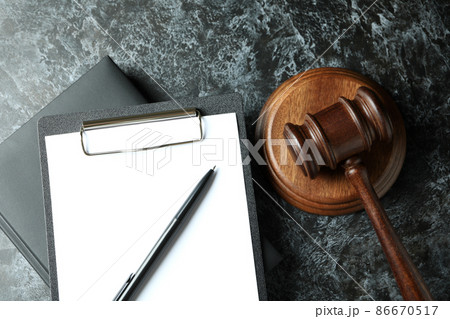 Law concept with judge gavel on black smokey table Law concept with judge gavel on black smokey table 86670517