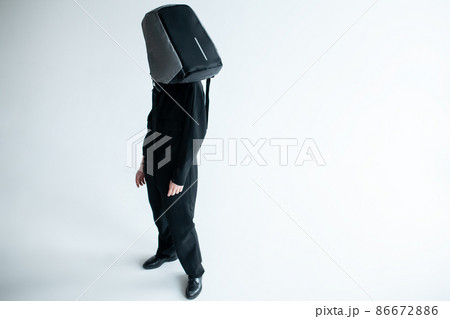 stylish hipster person holding modern backpack bag on white background stylish hipster person holding modern backpack bag on white background 86672886