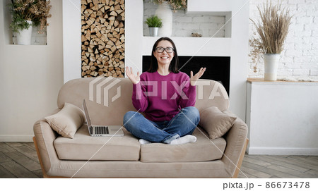 Excited asian girl winner with laptop computer, screaming yes and celebrating mobile online game victory success or getting ecommerce shopping offer. Startup business and mobile technology concept Excited asian girl winner with laptop computer, screaming yes and celebrating mobile online game victory success or getting ecommerce shopping offer. Startup business and mobile technology concept 86673478
