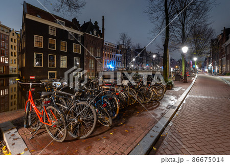 Amsterdam. Facades of old houses in the red light district. Amsterdam. Facades of old houses in the red light district. 86675014