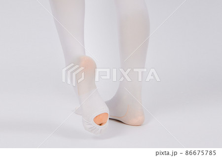Anti-embolic Compression Hosiery for surgery isolated on white. Medical white stockings, tights for varicose veins and venouse therapy. Thrombo embolic deterrent hose or anti-embolism stockings. Anti-embolic Compression Hosiery for surgery isolated on white. Medical white stockings, tights for varicose veins and venouse therapy. Thrombo embolic deterrent hose or anti-embolism stockings. 86675785
