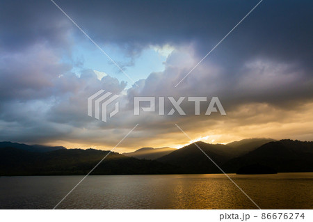 landscape Mountain with colorful vivid sunset on the cloudy sky 86676274