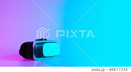 VR headset virtual reality. 3d digital glasses on futuristic neon tech background. Innovation device, cyberspace technology. 86677244