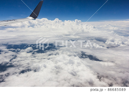 Blue sky with clouds on the airplane Blue sky with clouds on the airplane 86685089