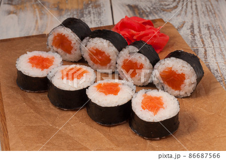 traditional Japanese cuisine. rice and salmon rolls traditional Japanese cuisine. rice and salmon rolls 86687566