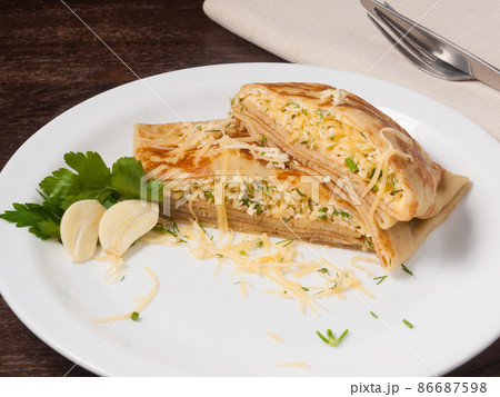 pancake khachapuri filled with cheese, herbs and garlic pancake khachapuri filled with cheese, herbs and garlic 86687598