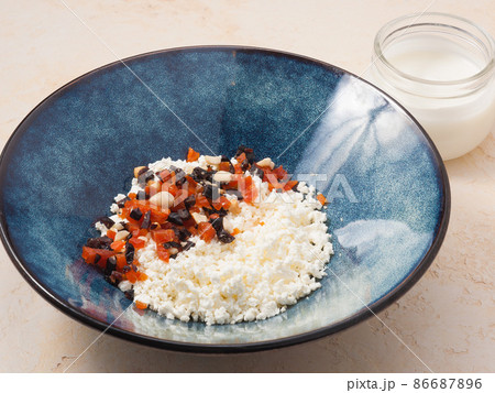 cottage cheese with dried fruits and homemade yogurt. Concept 86687896