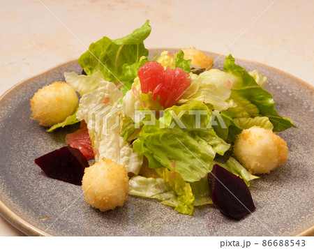 salad with homemade cheese, baked beetroot and lettuce salad with homemade cheese, baked beetroot and lettuce 86688543