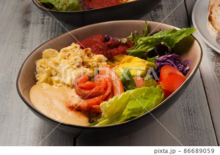 poke with salmon, avocado, omelet and vegetables poke with salmon, avocado, omelet and vegetables 86689059
