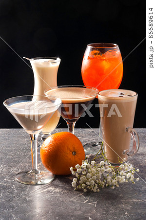 assorted popular alcoholic cocktails on a black background assorted popular alcoholic cocktails on a black background 86689614