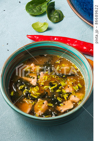 Asian soup with salmon and nori seaweed 86689622