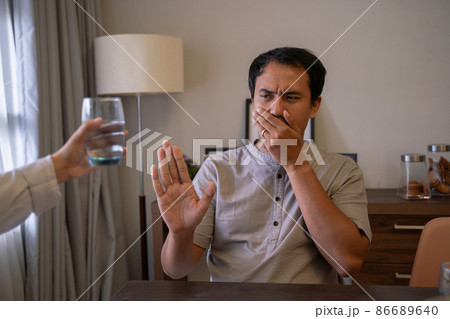 muslim man refuse the offer to drink water muslim man refuse the offer to drink water 86689640