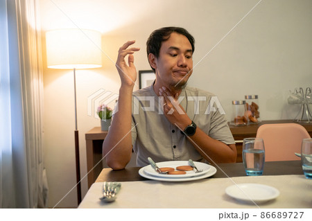 impatient muslim male waiting to break his fast 86689727