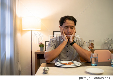 impatient muslim male waiting to break his fast impatient muslim male waiting to break his fast 86689773
