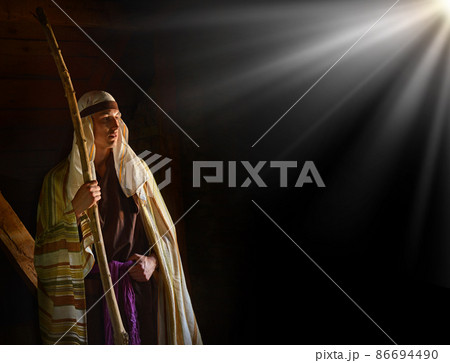 Ancient man with wooden wand Ancient man with wooden wand 86694490