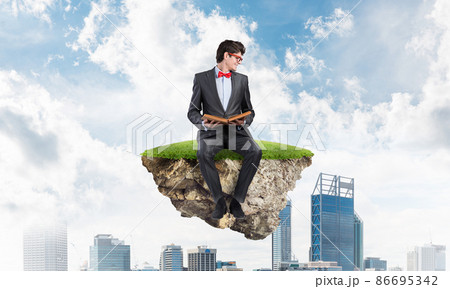 Young student with a book 86695342