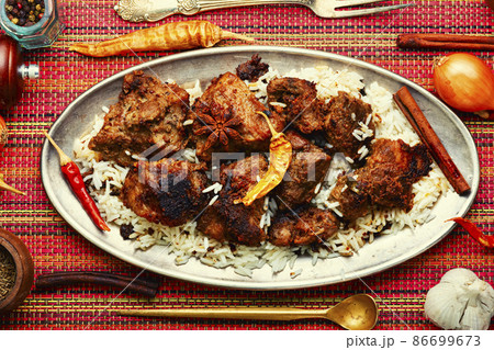 Pork vindaloo, a popular Indian dish. Pork vindaloo, a popular Indian dish. 86699673