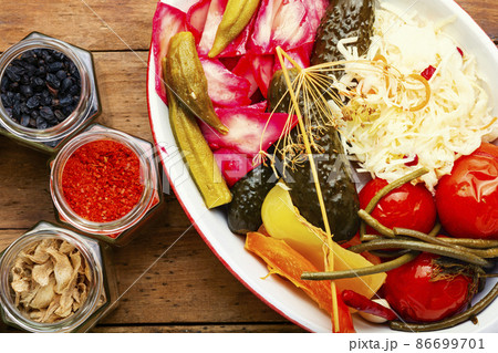 Delicious homemade pickles, preserved Delicious homemade pickles, preserved 86699701
