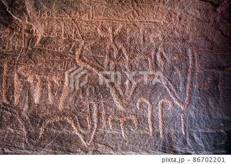 Nabatean and Thamudic inscriptions on rock in Wadi Rum desert 86702201